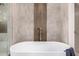 Modern bathroom with a walk-in shower and built-in bench at 9655 N 130Th St, Scottsdale, AZ 85259