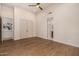 Spacious bedroom with wood floors and an ensuite bathroom at 9655 N 130Th St, Scottsdale, AZ 85259