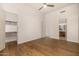 Light bedroom with wood floors and an ensuite bathroom at 9655 N 130Th St, Scottsdale, AZ 85259