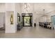 Bright and spacious entryway with high ceilings and stylish light fixtures at 9655 N 130Th St, Scottsdale, AZ 85259