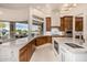 Bright kitchen with expansive windows, marble countertops, and modern design at 9655 N 130Th St, Scottsdale, AZ 85259