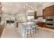 Open concept kitchen with large island, breakfast nook, and high-end finishes at 9655 N 130Th St, Scottsdale, AZ 85259