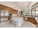 Spacious kitchen with island, stainless steel appliances, and ample cabinetry at 9655 N 130Th St, Scottsdale, AZ 85259