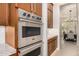 Double oven and cooktop in a modern kitchen setting at 9655 N 130Th St, Scottsdale, AZ 85259