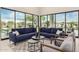 Living area with large windows and backyard access at 9655 N 130Th St, Scottsdale, AZ 85259