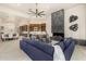 Open living room showcasing a linear fireplace and comfortable seating at 9655 N 130Th St, Scottsdale, AZ 85259