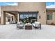 Relaxing patio with fire pit and comfortable seating at 9655 N 130Th St, Scottsdale, AZ 85259