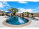 Luxury pool with spa, waterfall, and expansive patio at 9655 N 130Th St, Scottsdale, AZ 85259