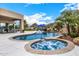 Resort-style pool and spa with outdoor seating and mountain views at 9655 N 130Th St, Scottsdale, AZ 85259