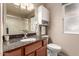 Bathroom features granite countertop and shower at 10020 N 109Th Ave, Sun City, AZ 85351