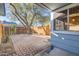 Private backyard with brick patio and mature trees at 10101 N 91St Ave # 81, Peoria, AZ 85345