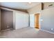 Bedroom with double door closet and neutral decor at 10101 N 91St Ave # 81, Peoria, AZ 85345