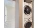 Convenient laundry room with stackable washer and dryer at 10101 N 91St Ave # 81, Peoria, AZ 85345