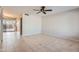 Living room with tile floors, neutral walls, and a ceiling fan at 10101 N 91St Ave # 81, Peoria, AZ 85345