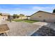 Large backyard with pool, patio, and play area at 10302 E Dolphin Ave, Mesa, AZ 85208