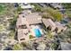 An expansive estate with a private pool and beautiful landscaping at 10712 E Greythorn Dr, Scottsdale, AZ 85262