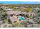 Stunning desert landscape surrounds this luxurious property with a pool at 10712 E Greythorn Dr, Scottsdale, AZ 85262