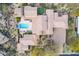 Bird's-eye view of a sprawling property with a pool and lush surroundings at 10712 E Greythorn Dr, Scottsdale, AZ 85262