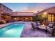 Relaxing backyard with fire pit and refreshing pool at 10712 E Greythorn Dr, Scottsdale, AZ 85262