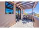 Private balcony with mountain views and pergola at 10712 E Greythorn Dr, Scottsdale, AZ 85262