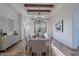 Bright dining room with hardwood floors and a chandelier at 10712 E Greythorn Dr, Scottsdale, AZ 85262