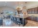 Gourmet kitchen with granite island, custom cabinetry, and high-end appliances at 10712 E Greythorn Dr, Scottsdale, AZ 85262