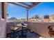 Private patio with scenic mountain views and pergola at 10712 E Greythorn Dr, Scottsdale, AZ 85262