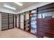 Spacious walk-in closet with ample shelving and hanging space at 10712 E Greythorn Dr, Scottsdale, AZ 85262