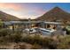 Contemporary home nestled in the mountains with expansive views at 11952 E Casitas Del Rio Dr, Scottsdale, AZ 85255