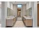 Elegant bathroom with double sinks, marble countertops, and large mirrors at 11952 E Casitas Del Rio Dr, Scottsdale, AZ 85255