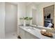 Modern bathroom with marble vanity, walk-in shower, and large mirror at 11952 E Casitas Del Rio Dr, Scottsdale, AZ 85255