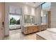 Spa-like bathroom with soaking tub, double vanity, and marble floors at 11952 E Casitas Del Rio Dr, Scottsdale, AZ 85255