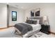 Bedroom with gray bedding and nightstands at 11952 E Casitas Del Rio Dr, Scottsdale, AZ 85255