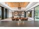 Open concept dining area with modern light fixtures at 11952 E Casitas Del Rio Dr, Scottsdale, AZ 85255