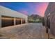 Three-car garage with herringbone driveway at 11952 E Casitas Del Rio Dr, Scottsdale, AZ 85255