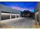 Three-car garage with herringbone driveway at 11952 E Casitas Del Rio Dr, Scottsdale, AZ 85255