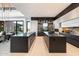 Bright kitchen with marble backsplash and modern fixtures at 11952 E Casitas Del Rio Dr, Scottsdale, AZ 85255