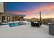 Luxury pool and patio area with outdoor dining furniture at 11952 E Casitas Del Rio Dr, Scottsdale, AZ 85255