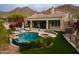 Luxury home with a large pool, spa, and mountain views at 12026 N 138Th St, Scottsdale, AZ 85259