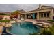 Relaxing pool area with a large patio and beautiful landscaping at 12026 N 138Th St, Scottsdale, AZ 85259