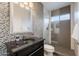 Modern bathroom with mosaic tile and a walk-in shower at 12026 N 138Th St, Scottsdale, AZ 85259