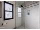 Bright bathroom with a large walk-in shower and marble tile at 12026 N 138Th St, Scottsdale, AZ 85259