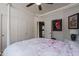 Bedroom with white four poster bed and closet at 12026 N 138Th St, Scottsdale, AZ 85259