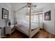 Bedroom with four-poster bed and mountain views at 12026 N 138Th St, Scottsdale, AZ 85259