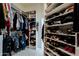 Spacious walk-in closet with custom shelving and drawers at 12026 N 138Th St, Scottsdale, AZ 85259