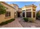 Mediterranean style home with a courtyard entry and lush landscaping at 12026 N 138Th St, Scottsdale, AZ 85259