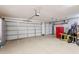 Spacious two-car garage with ample storage and overhead storage at 12026 N 138Th St, Scottsdale, AZ 85259