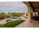 Covered patio overlooking a refreshing pool and spa at 12026 N 138Th St, Scottsdale, AZ 85259