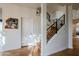 Modern staircase with metal railing and hardwood floors at 12026 N 138Th St, Scottsdale, AZ 85259