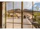 Scenic view of houses and mountains from bedroom window at 12026 N 138Th St, Scottsdale, AZ 85259